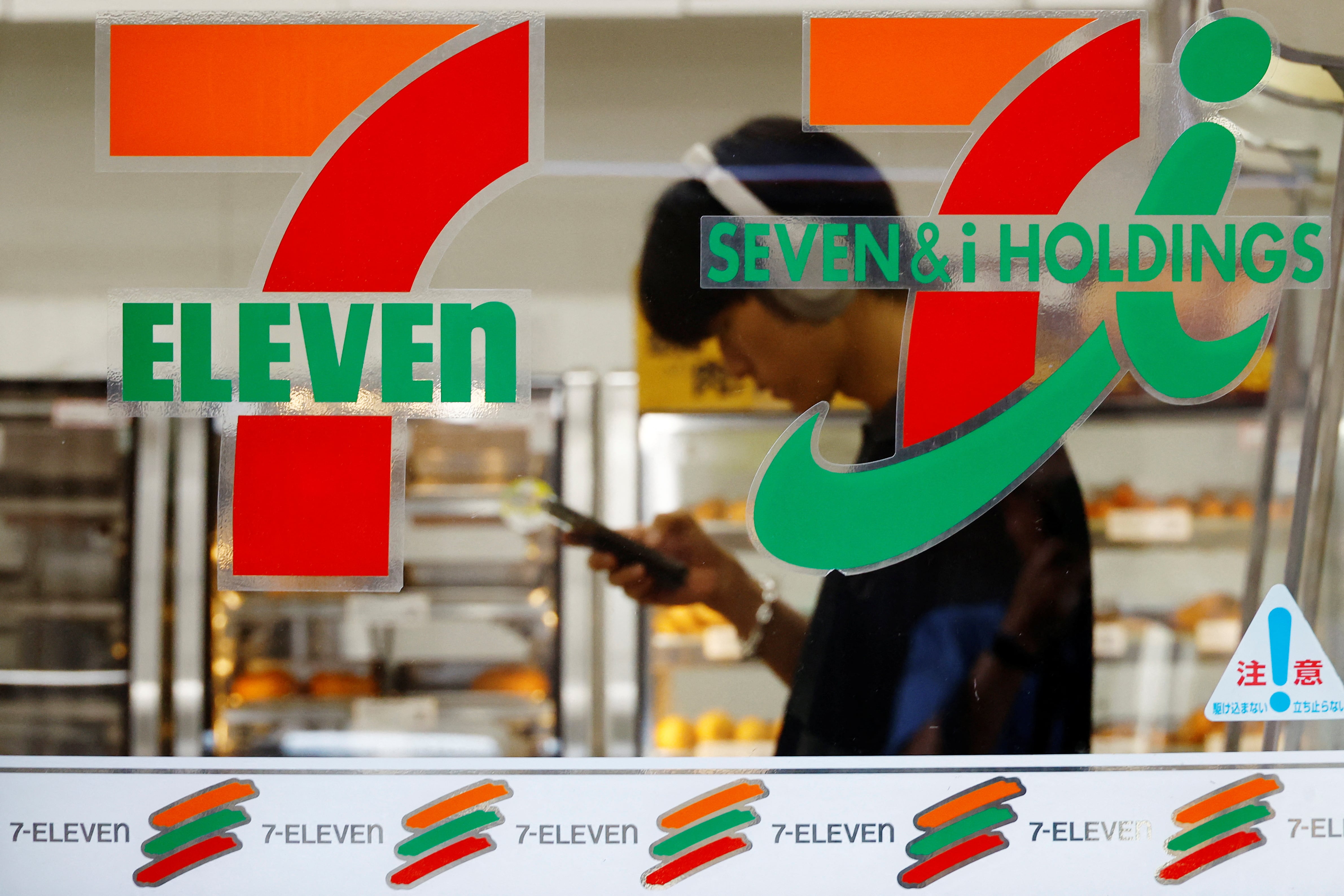 Japan's Seven & I’s logo is seen at its 7-Eleven convenience store in Tokyo, Japan August 19,  2024. REUTERS/Kim Kyung-Hoon