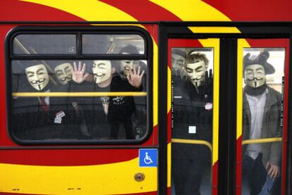 Demonstrators from the Anonymous group protest against the Church of Scientology in London in 2008.