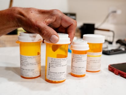 Jesús Resendez, a patient of Dr. Michael Sobolevsky, shows the medications he uses to control his diabetes at his home in San Antonio, Texas on Friday, May 17, 2024.