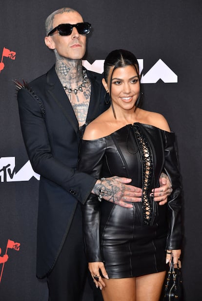 Travis Barker and Kourtney Kardashian pose on the red carpet of the MTV Video Music Awards at the Barclays Center in New York, September, 2021.