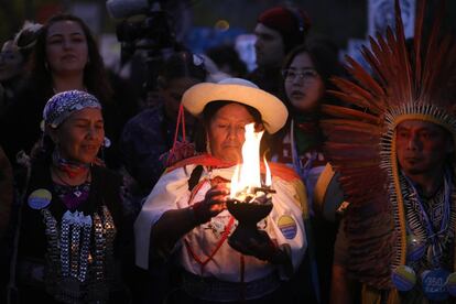 Indigenous activists from Chile lead the march through Madrid.