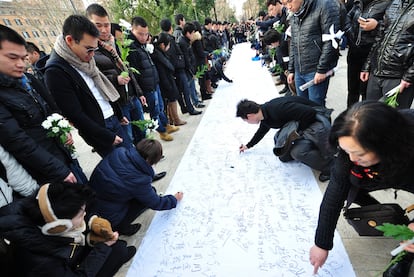 Acto de protesta por el asesinato de Zhou Zeng y su hija Joy, en Roma.