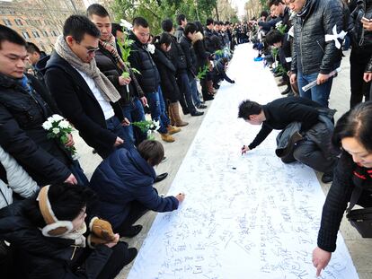 Acto de protesta por el asesinato de Zhou Zeng y su hija Joy, en Roma.