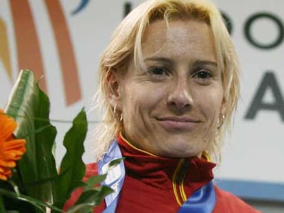 Marta Domínguez, en el podio.