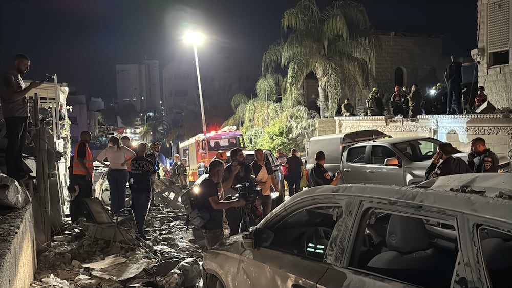 TAMRA, ISRAEL - JUNE 15: Israeli civil defense teams carry out operations after Iranian missiles hit a two-storey building, killing 4 and injuring many in Tamra, Israel on June 15, 2025. Several buildings and streets near Haifa, Tamra, and Krayot sustained 'heavy damage' as a result of the missiles falling, Channel 12 reported. (Photo by Samir Abdalhade/Anadolu via Getty Images)