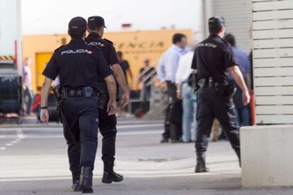Police arrive in the Son Moix parking lot Thursday after the explosion.