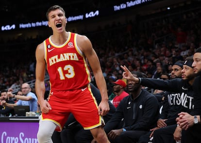 In this file photo taken on February 26, 2023 Bogdan Bogdanovic of the Atlanta Hawks reacts after a basket against the Brooklyn Nets during the fourth quarter at State Farm Arena in Atlanta, Georgia.