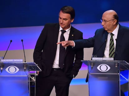 Los candidatos Jair Bolsonaro y Henrique Meirelles en un debate electoral el pasado jueves