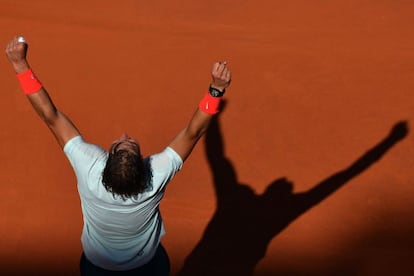 Spain&#039;s Rafael Nadal celebrates defeating Switzerland&#039;s Roger Federer at the end of the final of the ATP Rome Masters.