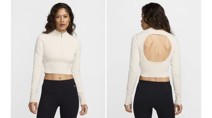 Women's sports sweater with zipper at the neck.