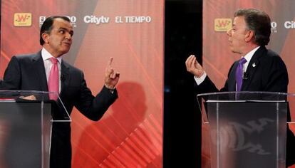 Zuluaga (l) and Santos during the debate.