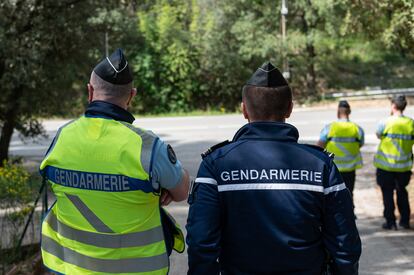 A group of French gendarmerie officers along the road carrying out roadside checks, in a file image.