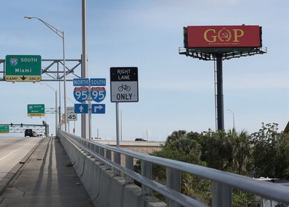 A sign with the words "GOP" and the "O" in the shape of a hammer and sickle topped by a star, imitating the flag of the former Soviet Union. The sign was placed along the highway on which Donald Trump drives on his way from Palm Beach International Airport to his home at Mar-A-Lago when visiting Florida.