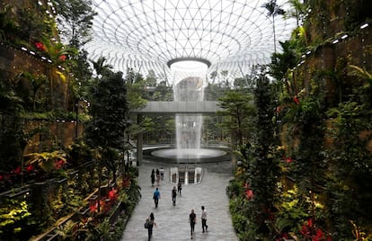 The 40-metre high Rain Vortex, which is the world's tallest indoor waterfall, is seen from inside Jewel Changi Airport in Singapore, April 11, 2019. REUTERS/Feline Lim      TPX IMAGES OF THE DAY