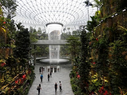 The 40-metre high Rain Vortex, which is the world's tallest indoor waterfall, is seen from inside Jewel Changi Airport in Singapore, April 11, 2019. REUTERS/Feline Lim      TPX IMAGES OF THE DAY