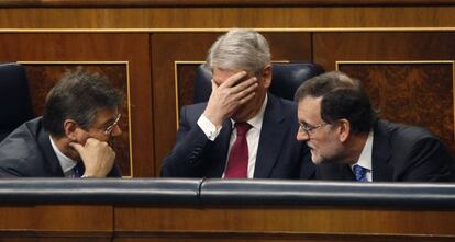 El presidente del Gobierno, Mariano Rajoy, y los ministros de Justicia y de Exteriores.