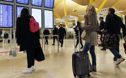 Passengers in Terminal 4 at Adolfo Suárez Madrid-Barajas International Airport.