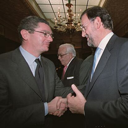 Alberto Ruiz-Gallardón y Mariano Rajoy.