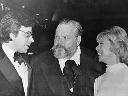 Peter Bogdanovich, Orson Welles y Dinah Shore, en 1975.