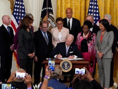 President Joe Biden signs an executive order in the East Room of the White House, May 25, 2022, in Washington.