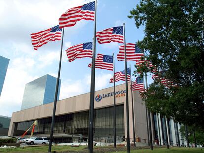 Flags fly in front of the Lakewood Church in Houston, June 28, 2005.