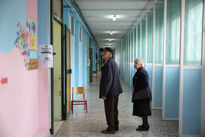 People wait to vote at a polling station, during the general election, in Thessaloniki, Greece, May 21, 2023.