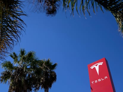 A Tesla sign is seen in Buena Park, California, USA, 01 December 2023.