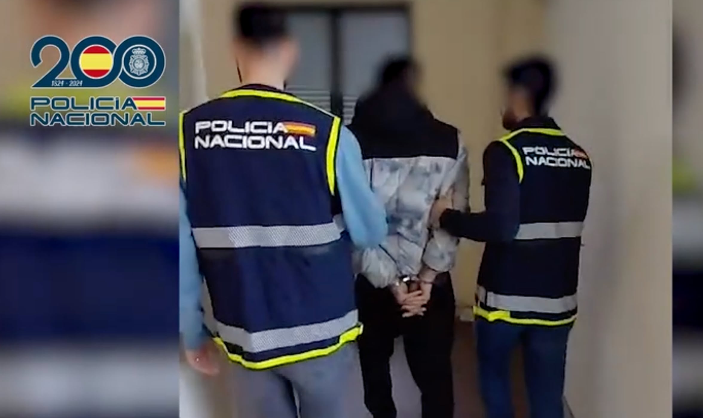 Uno de los detenidos por el secuestro de un hombre en Leganés, en la comisaría del municipio.