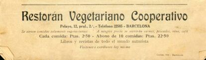 Un anunci d'un restaurant vegetarià al carrer del Call.