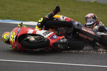 Rossi and Stoner come together during the Spanish Grand Prix on Sunday.