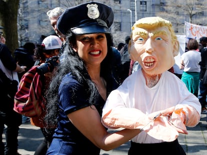 A Donald Trump opponent with a dummy of the former president, on Tuesday near the Manhattan courthouse.