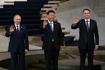 El presidente ruso, Vladímir Putin, y sus homólogos chino, Xi Jinping, y brasileño, Jair Bolsonaro, en noviembre de 2019 en Brasilia.