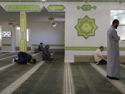 People gather to pray at the Dearborn American Muslim Center.