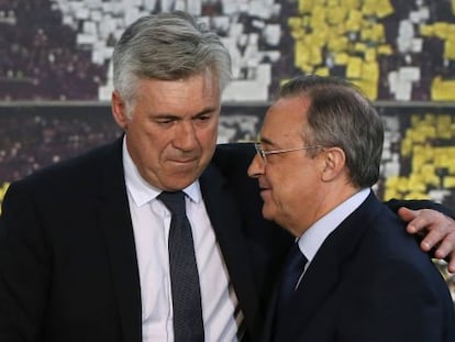 Carlo Ancelotti (left) is congratulated by Real Madrid president Florentino P&eacute;rez at the coach&#039;s presentation on Wednesday.