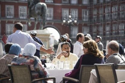 Tourists in Madrid’s Plaza Mayor.