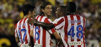 Los jugadores del Atlético celebran uno de los goles.