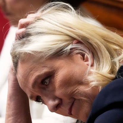 French far-right leader Marine Le Pen reacts at the National Assembly during a session Tuesday, April 1, 2025 in Paris. (AP Photo/Michel Euler)