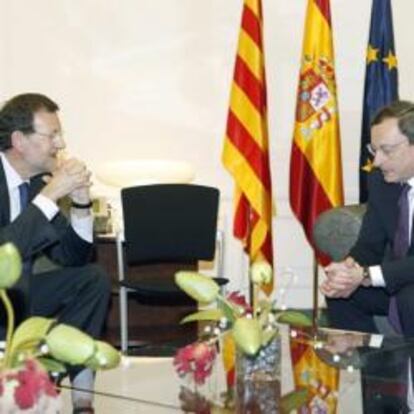 Mariano Rajoy, con Mario Draghi en su encuentro en Barcelona en mayo