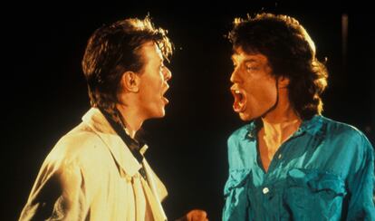 En la foto junto a Mick Jagger, en 1985.