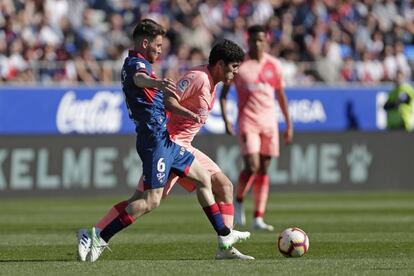 Carlos Alena y  Moi Gómez, en un momento del partido.