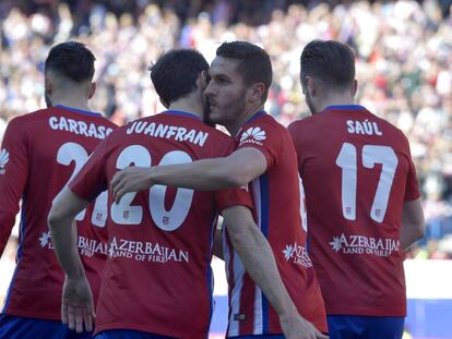 Koke y Juanfran celebran el primer gol del Atlético al Granada.