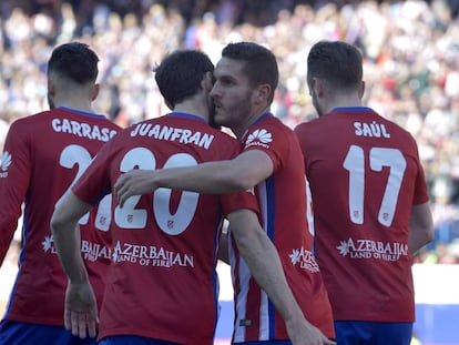 Koke y Juanfran celebran el primer gol del Atlético al Granada.