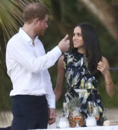 Enrique de Inglaterra y Meghan Markle, en una boda en Jamaica el pasado marzo.