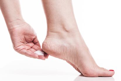 care for dry skin on the well-groomed feet and heels with creams for the skin and feet.