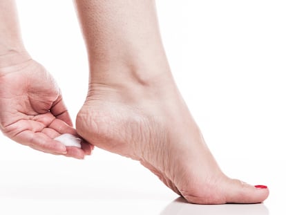 care for dry skin on the well-groomed feet and heels with creams for the skin and feet.