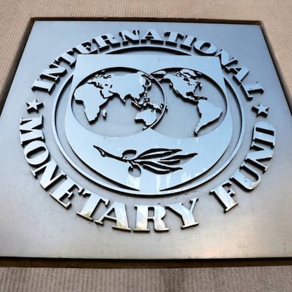 FILE PHOTO: International Monetary Fund logo is seen outside the headquarters building during the IMF/World Bank spring meeting in Washington, U.S., April 20, 2018. REUTERS/Yuri Gripas/File Photo