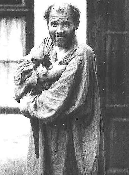 Gustav Klimt, at the entrance to his studio, photographed by Moritz Nahr in 1912.