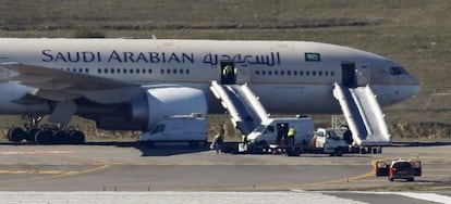 Saudi Arabian Airlines flight SVA 226 is isolated on the tarmac after its passengers and crew were evacuated following a bomb threat, at the Barajas airport in Madrid