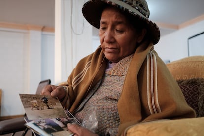  Doña Lidia looks at a photo of her daughter Juliva, who disappeared on July 10, 2014, when she was on her way to university. 