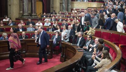 The opposition walks out of parliament in protest on Thursday.